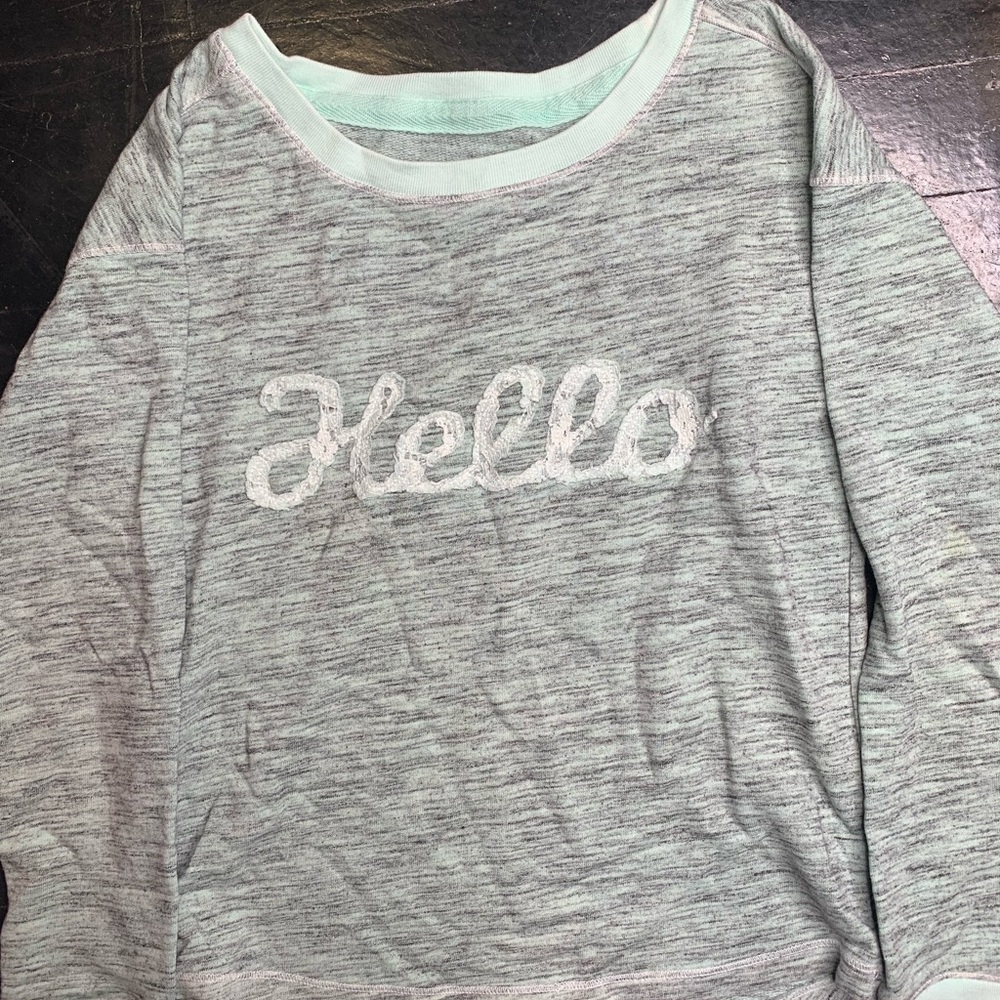 Round neck turquoise light sweater
